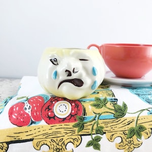 Kitschy Anthropomorphic Crying Onion