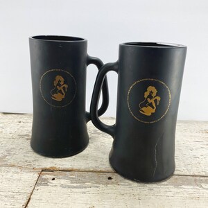 Pair of Vintage Black Playboy Club Steins