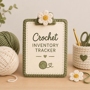 May include: A rectangular clipboard with a green crocheted border and a white daisy embellishment at the top. The center card features the text "Crochet INVENTORY TRACKER" with a small heart and a yarn ball icon in dark green ink.