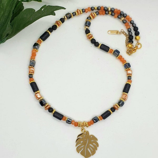 Collier ras de cou noir orange perle céramique perles cornaline apprêts dorés