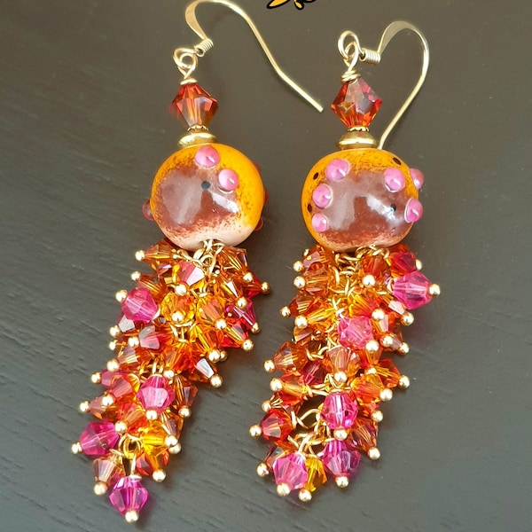 Boucles d'oreilles perles en verre filé tons orange marron perles swarovski.