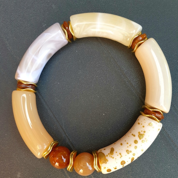 Bracelet élastique connecteurs résine de 12mm perles jade ton marrons.