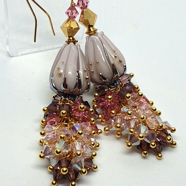 Jolies boucles d'oreilles perles en verre filé de Murano perles swarovski parme rose  apprêts dorés.