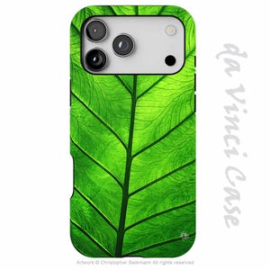 May include: A green phone case featuring a detailed leaf pattern. The case has a glossy finish and a cutout for the camera. The text "da Vinci Case" is printed on the side. The artwork is by Christopher Beikmann.