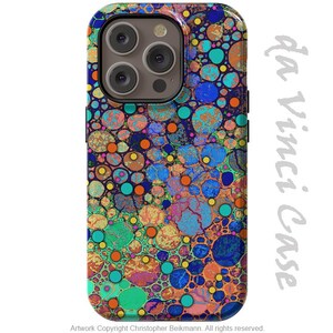 May include: A colorful phone case with a pattern of blue, orange, yellow, and green circles. The case is designed for an iPhone 13 Pro Max.