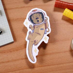 sticker : otternaut ** otter riverotter spaceman astronaut space stars adventure cartoon kids * matte vinyl