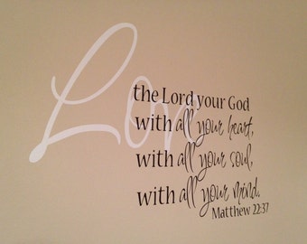 May include: A white cursive "Love" with a black text quote below: "Love the Lord your God with all your heart, with all your soul, with all your mind. Matthew 22:37"