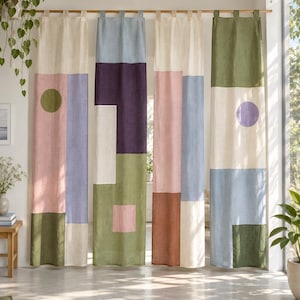 May include: Four floor-length curtains hanging from a wooden rod, each featuring a unique colour-blocked pattern. The panels display geometric shapes including circles, rectangles, and squares in shades of olive green, light blue, cream, pink, and purple.