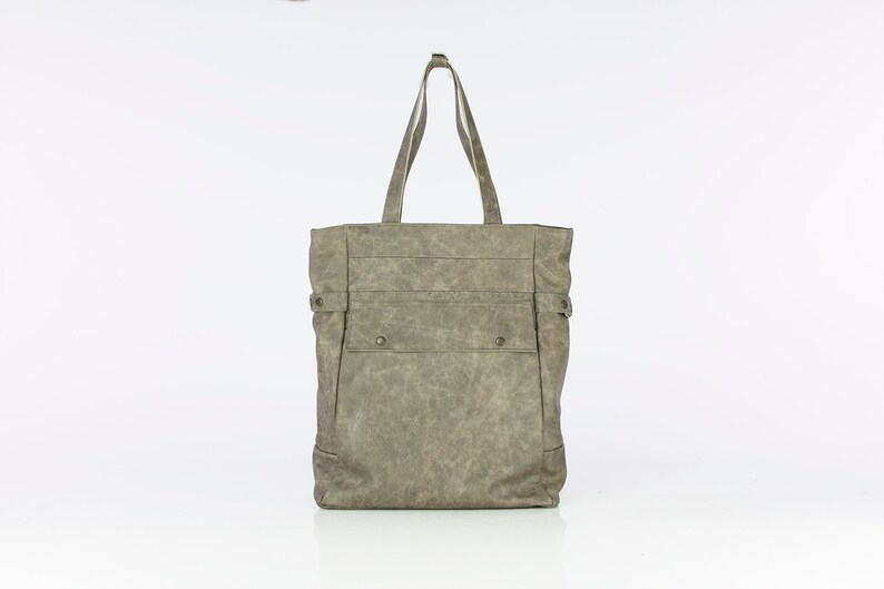 leather bag converts to backpack