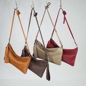 Small leather cross body bags for women in soft leather - Everyday clutch with long strap and leather wrist strap