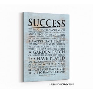 May include: A blue and white canvas print with a quote by Ralph Waldo Emerson about success. The quote reads: "To laugh often and much... This is to have succeeded."