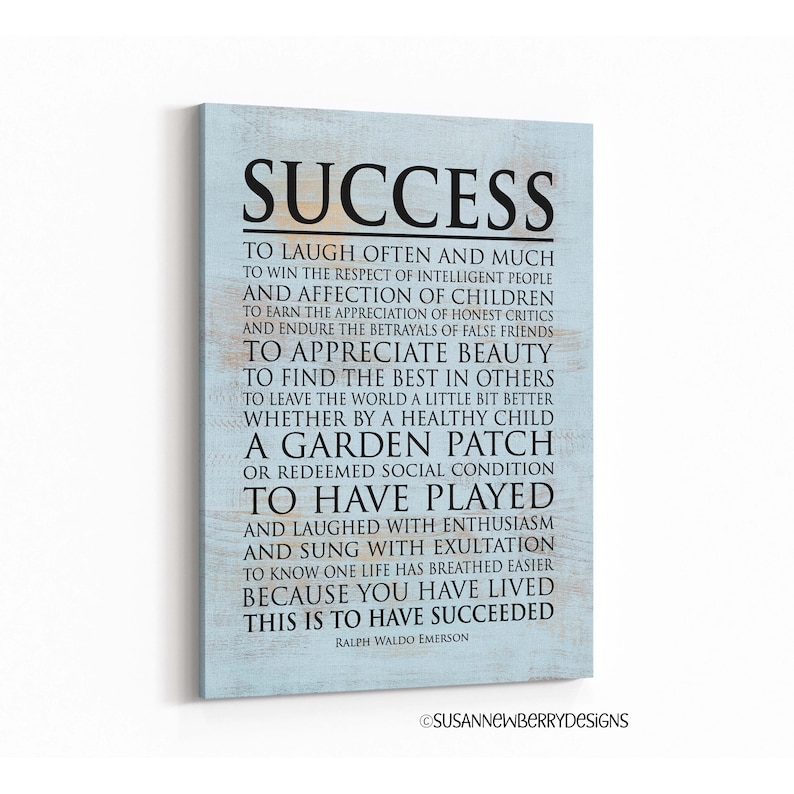 May include: A blue and white canvas print with a quote by Ralph Waldo Emerson about success. The quote reads: "To laugh often and much... This is to have succeeded."
