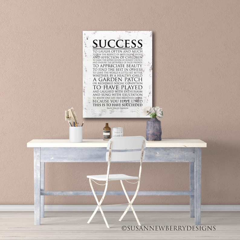 May include: A white canvas print with a black and white text quote about success by Ralph Waldo Emerson. The quote reads: "To laugh often and much... This is to have succeeded."