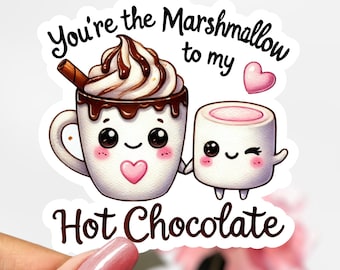 May include: A sticker with a cartoon hot chocolate mug and marshmallow. The mug has a smiling face and a heart. The marshmallow has a winking face. The text reads "You're the marshmallow to my hot chocolate".