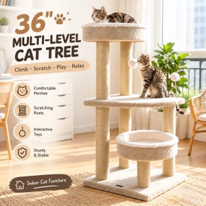 May include: A 36-inch multi-level cat tree featuring beige carpeted platforms, sisal-wrapped scratching posts, and two hanging white pom-pom toys. The structure includes a top perch and a lower circular bed, designed for indoor feline use.
