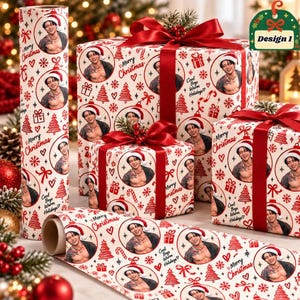 May include: White wrapping paper featuring a repeating pattern of red Christmas trees, snowflakes, hearts, and circular portraits of a shirtless person wearing a Santa hat. The text Merry Christmas and Cool Boys Warm Holidays is printed throughout.