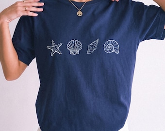 Camiseta con estampado de conchas marinas, para amantes del océano, estilo veraniego costero, 100% algodón.
