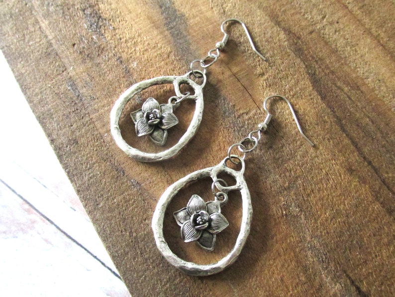 hammered hoop earrings with pewter magnolia leaf charm