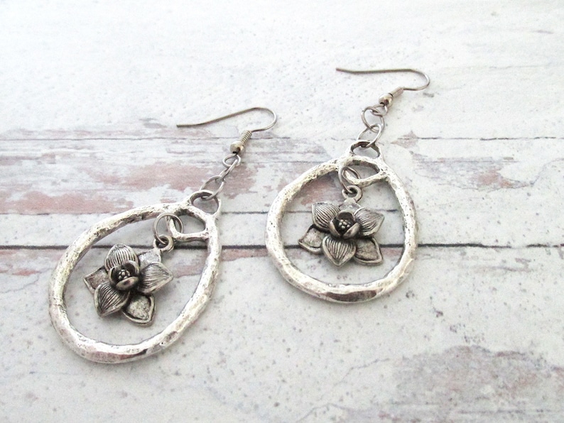 hammered hoop earrings with pewter magnolia leaf charm