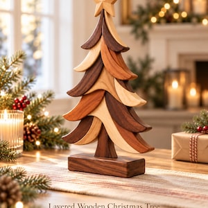May include: A decorative wooden Christmas tree sculpture composed of stacked, curved layers in varying shades of light, medium, and dark brown wood, topped with a five-pointed star. Text reads: Layered Wooden Christmas Tree Digital Woodworking Plan.
