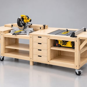 May include: A light-colored wooden workbench on wheels featuring four central drawers, open shelving, a yellow and black miter saw on the left side, and a yellow and black table saw integrated into the right side of the flat surface.