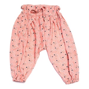 May include: Pink floral print pants with a drawstring waist.