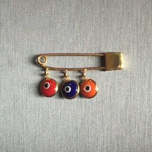 Hye Em Yes-Gold Evil Eye Safety Pin