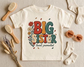 Camiseta divertida para hermana mayor, camiseta para niña pequeña para hermana mayor, camiseta floral para hermana mayor, anuncio de nuevo bebé, regalo para revelar la identidad del hermano/a, regalo para hermana mayor