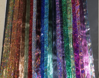 46"-100%thai silk strands, 100 strands per package. Salon Quality,54 colors available (fairy hair, hair tinsel, bling)