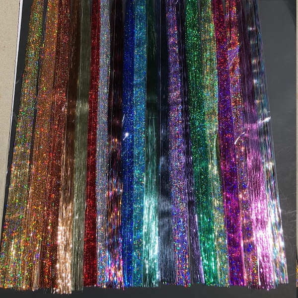 46"-100%thai silk strands, 100 strands per package. Salon Quality,54 colors available (fairy hair, hair tinsel, bling)
