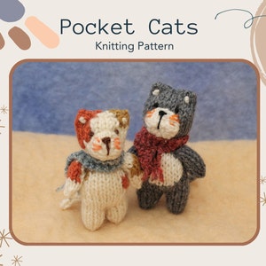 May include: Two knitted cat toys, one grey and one white with orange and brown patches. The grey cat is wearing a red scarf and the white cat is wearing a blue scarf. The text "Pocket Cats Knitting Pattern" is at the top of the image.