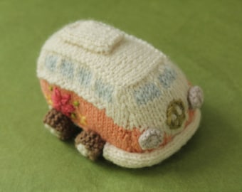 Hand Knitted Camper Van with A Peach Sign