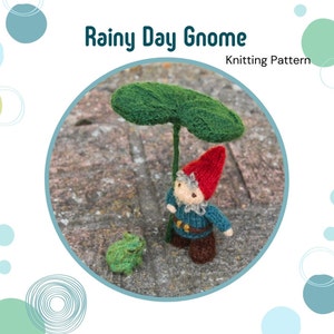 May include: Knitting pattern for a gnome wearing a red hat and blue sweater, standing under a green leaf, with a green frog in the foreground. The pattern is titled "Rainy Day Gnome".