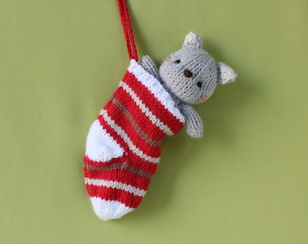 Knitted cat in a sock, knitted toy