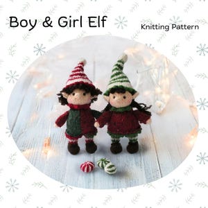 May include: Knitting pattern for a boy and girl elf doll. The boy elf is wearing a green and red outfit with a white hat. The girl elf is wearing a red and green outfit with a white hat. Both elves have brown hair and are holding candy canes.