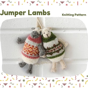 May include: Two knitted lamb ornaments wearing colorful sweaters. One lamb has a red, orange, and yellow patterned sweater, while the other has a green and brown patterned sweater. The text "Jumper Lambs Knitting Pattern" is at the top.
