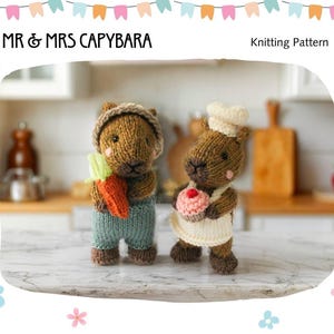 May include: Two knitted capybara figures, one wearing a tan hat and blue overalls holding an orange carrot, the other wearing a white chef hat and apron holding a pink cupcake. The text reads MR & MRS CAPYBARA Knitting Pattern.