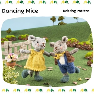 May include: Knitting pattern for two dancing mice. One mouse is wearing a yellow dress and the other is wearing blue trousers and a brown waistcoat. The mice are standing on a green grassy surface with a wooden fence in the background.