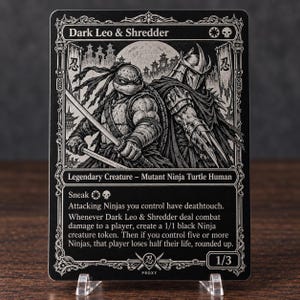 May include: A black and white trading card titled Dark Leo & Shredder featuring an illustration of a turtle warrior and a masked fighter. The card text includes Legendary Creature, Mutant Ninja Turtle Human, and game rules for combat damage.