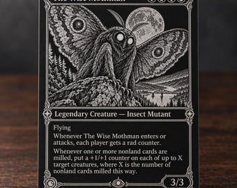 May include: A black and white collectible game card titled The Wise Mothman, featuring a detailed illustration of a moth-like creature perched on a rock under a full moon. The card text includes Legendary Creature, Insect Mutant, and game rules.