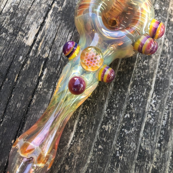 HONEYCOMB Glass pipes.HONEYCOMB with purple and yellow highlights. Fumed with silver and gold, color changing. Awesome piece