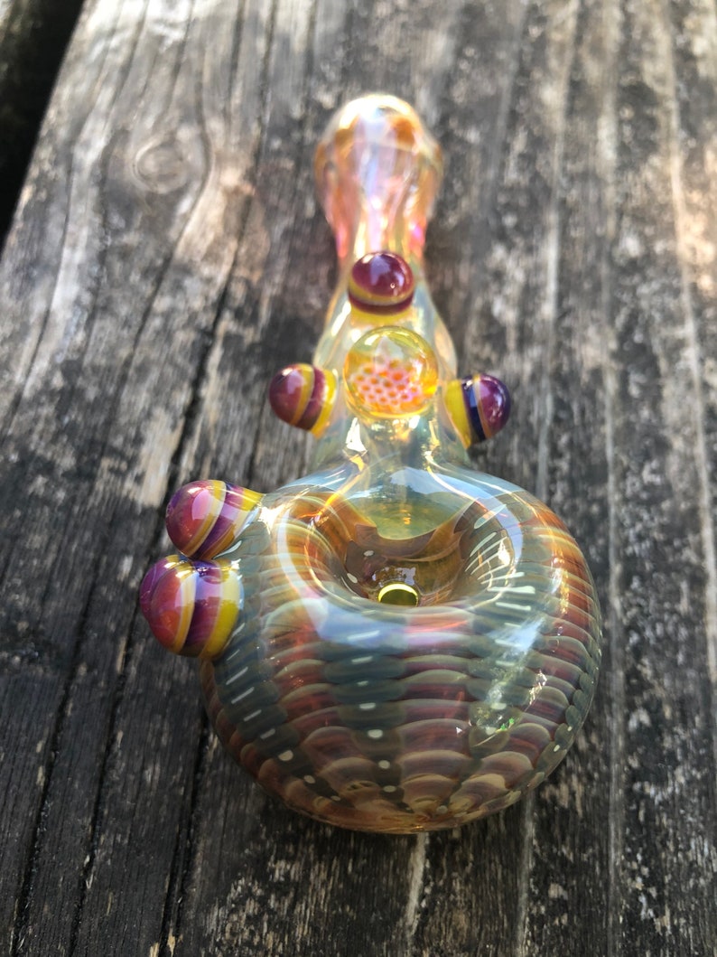 HONEYCOMB Glass pipes.HONEYCOMB with purple and yellow highlights. Fumed with silver and gold, color changing. Awesome piece image 6