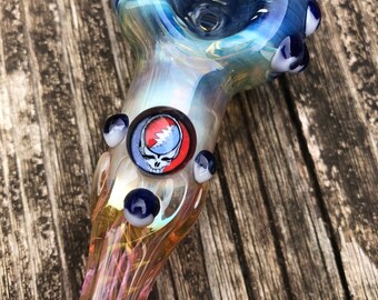 SYF DEAD Glass spoon. SYF millie with blue highlights. Fumed with silver and gold, color changing. Awesome piece