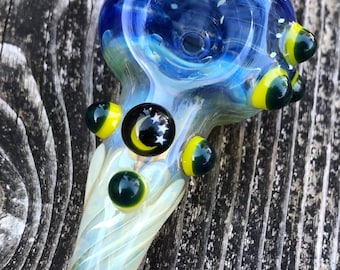 MOON and Stars Glass pipes.Moon and stars millie with yellow and dark highlights. Fumed with silver and gold, color changing. Awesome piece