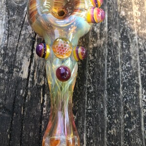 HONEYCOMB Glass pipes.HONEYCOMB with purple and yellow highlights. Fumed with silver and gold, color changing. Awesome piece image 4