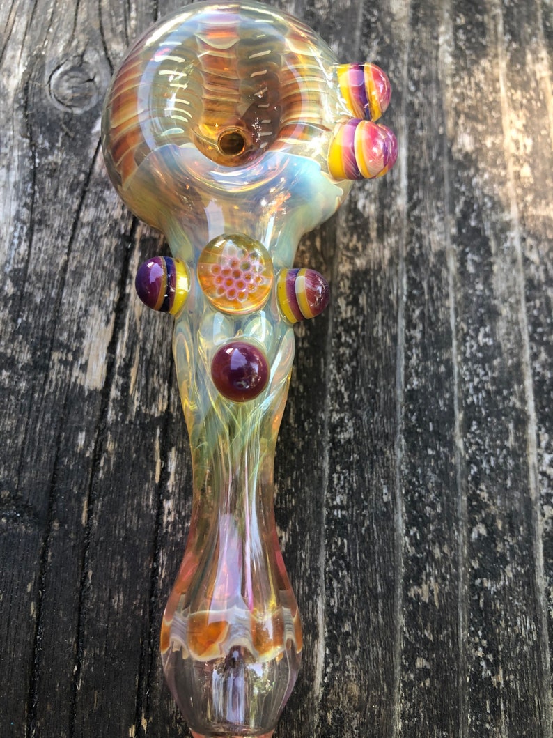 HONEYCOMB Glass pipes.HONEYCOMB with purple and yellow highlights. Fumed with silver and gold, color changing. Awesome piece image 4