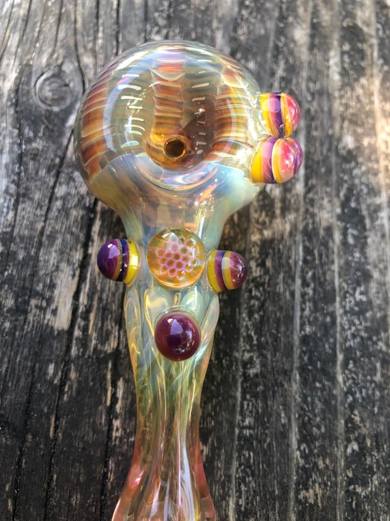 HONEYCOMB Glass pipes.HONEYCOMB with purple and yellow highlights. Fumed with silver and gold, color changing. Awesome piece image 3