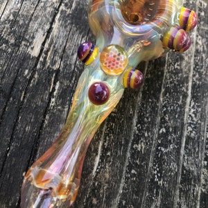 HONEYCOMB Glass pipes.HONEYCOMB with purple and yellow highlights. Fumed with silver and gold, color changing. Awesome piece image 5