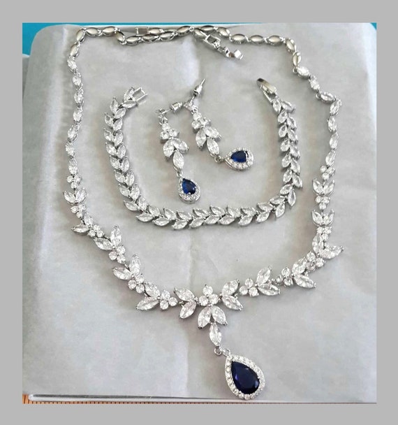 Buy Peora Splendid Statuesque Blue Colour Necklace Earring Set for Women &  Girls (PX9N03) Online