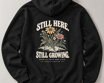 Still Here Still Growing Hoodie, Black Pullover with Floral Back Print